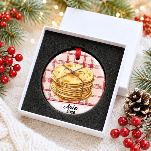 Personalized tortilla ceramic ornament with name and year on red plaid in a white gift box with protective foam