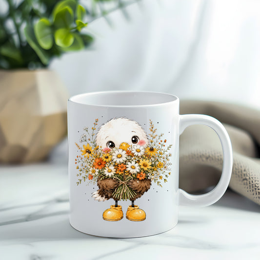 Baby Eagle Holding Daisy Bouquet UV DTF sticker applied to a white coffee mug