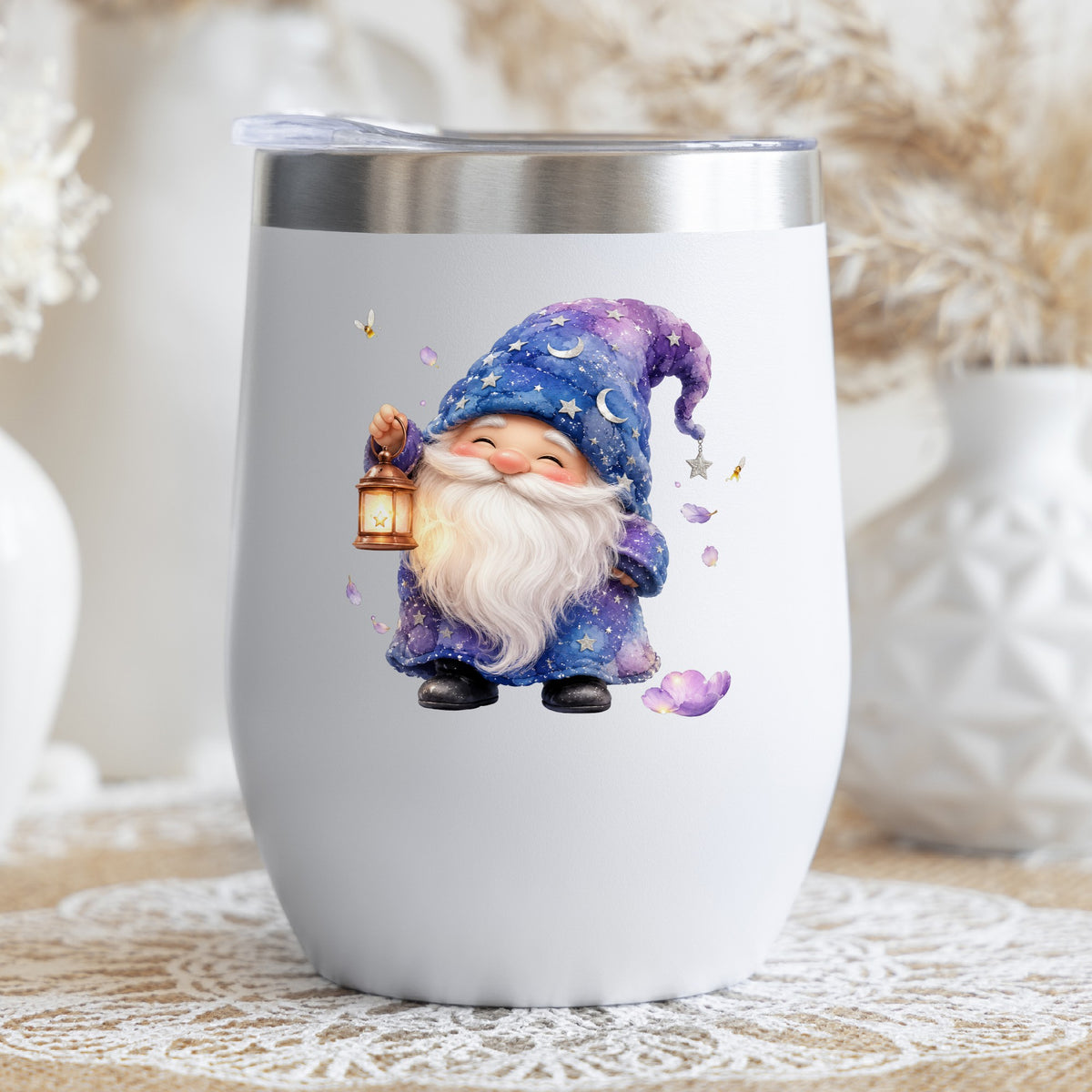 Gnome Holding A Lantern UV DTF sticker applied to a white stemless tumbler with a lid