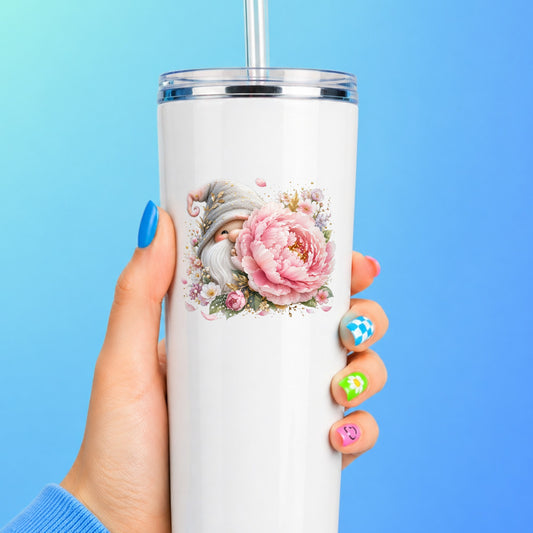 Gnome With Pink Peony UV DTF sticker applied to a white straw tumbler on a blue background