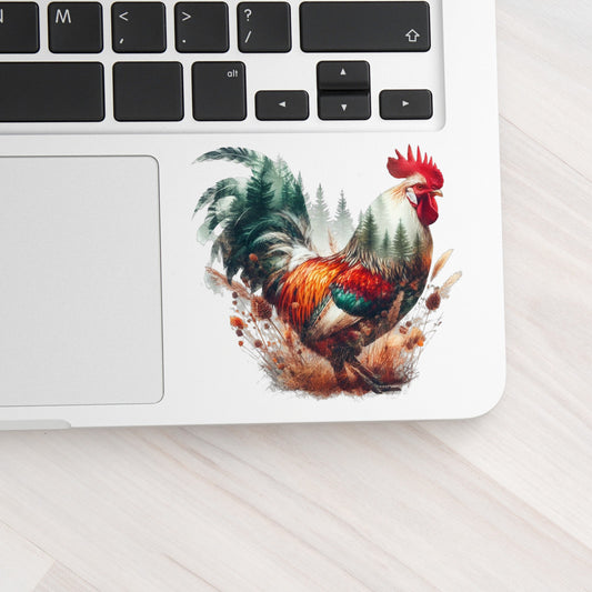 Colorful Rooster UV DTF sticker applied to a silver laptop beside the keyboard