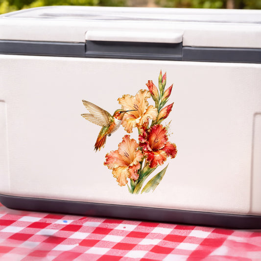 Hummingbird Peach Gladiolus UV DTF sticker applied to a white cooler on a red gingham cloth