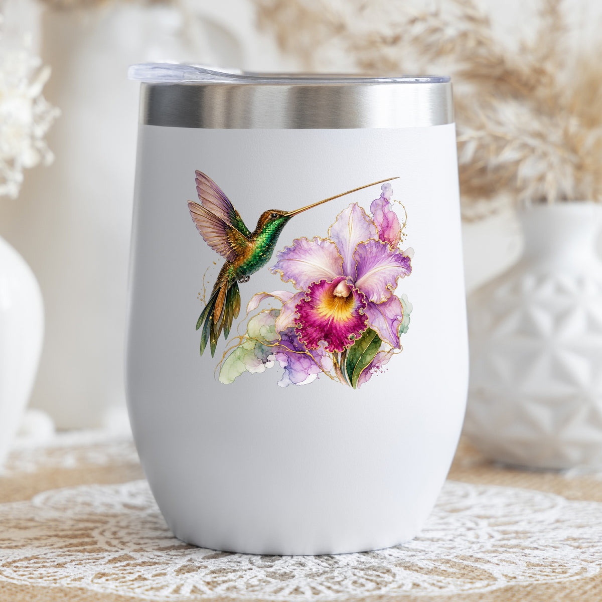Hummingbird Purple Orchid UV DTF sticker applied to a white stemless tumbler with a lid