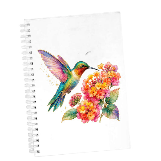 Rainbow Hummingbird Lantana UV DTF sticker applied to the cover of a white spiral journal