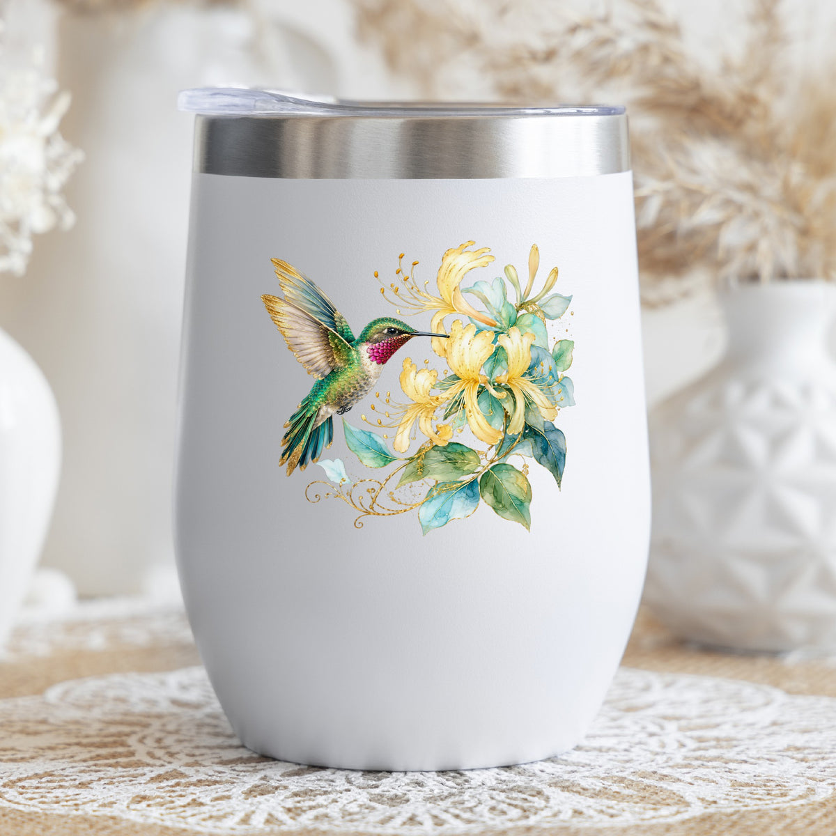 Hummingbird Yellow Honeysuckle UV DTF sticker applied to a white stemless tumbler with a lid