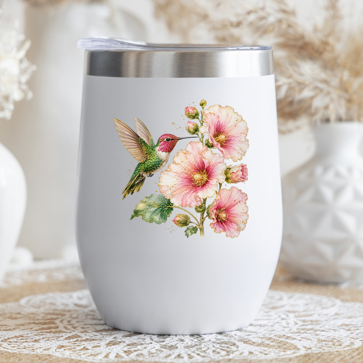 Hummingbird Pink Hollyhock UV DTF sticker applied to a white stemless tumbler with a lid