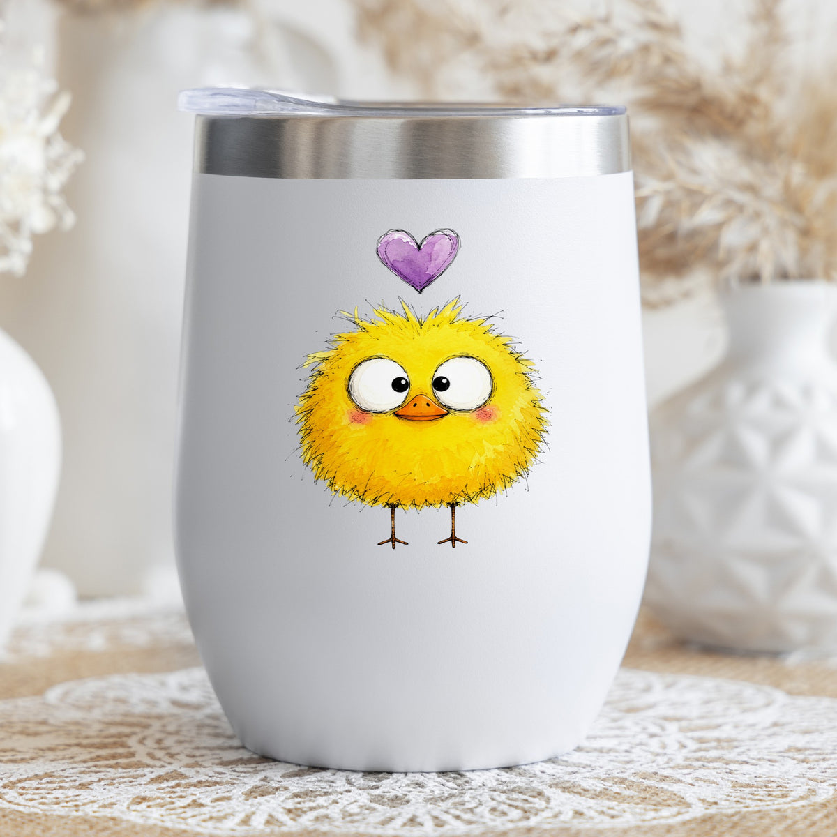 Fluffy Yellow Duckling UV DTF sticker applied to a white stemless tumbler with a lid