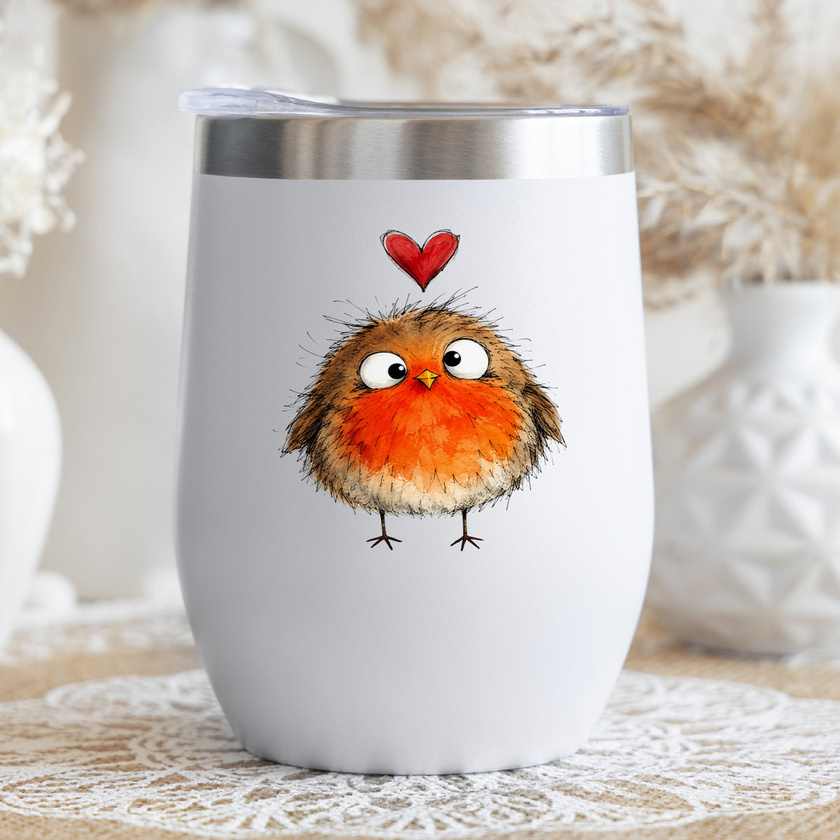 Fluffy Robin UV DTF sticker applied to a white stemless tumbler with a lid