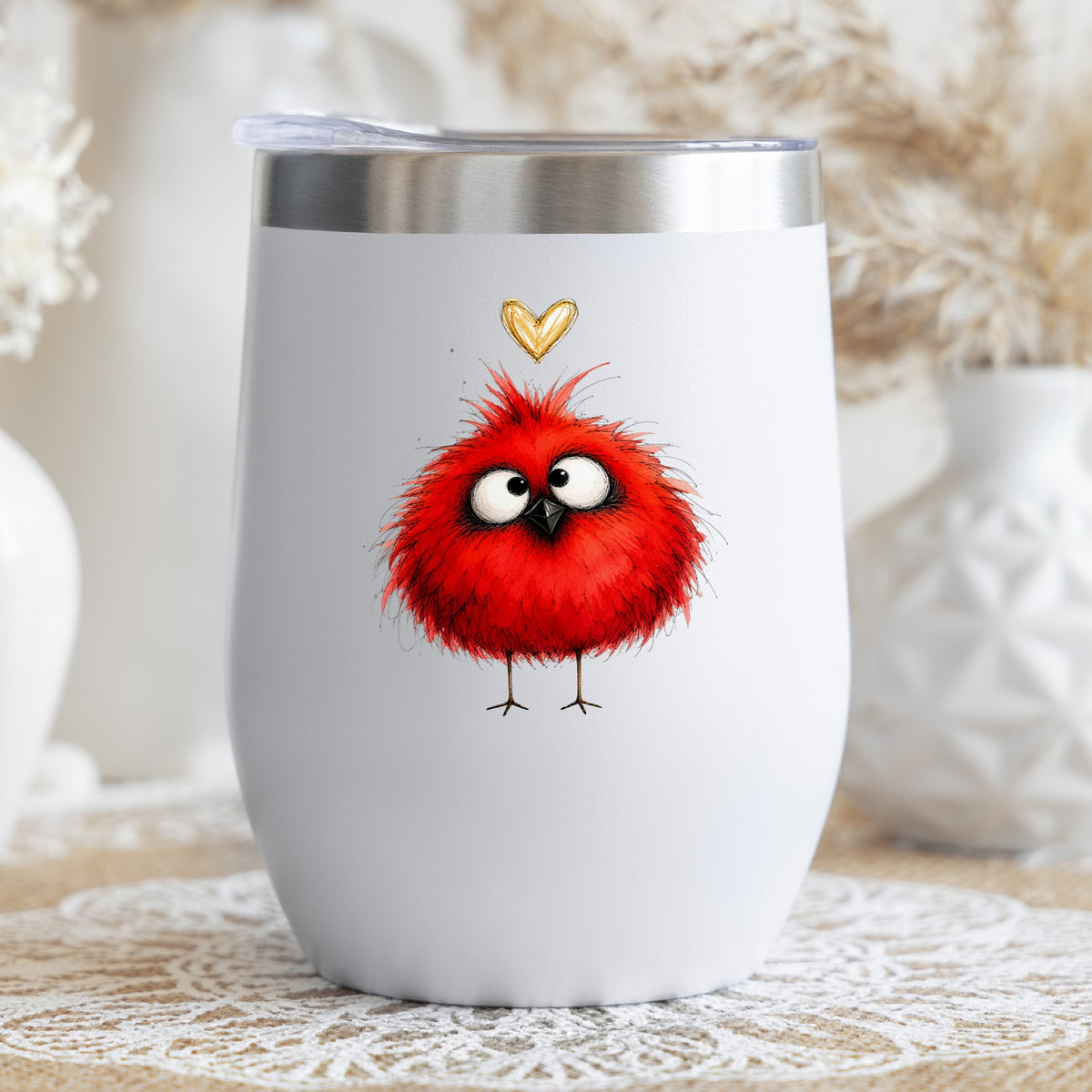 Funny Red Cardinal UV DTF sticker applied to a white stemless tumbler with a lid
