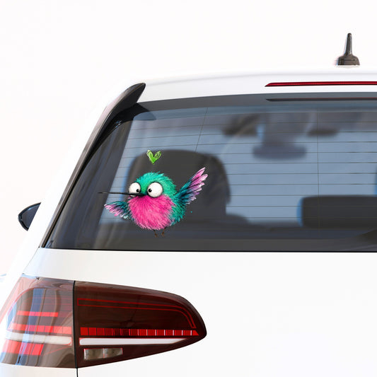 Flying Cartoon Hummingbird UV DTF sticker applied to the rear window of a white car