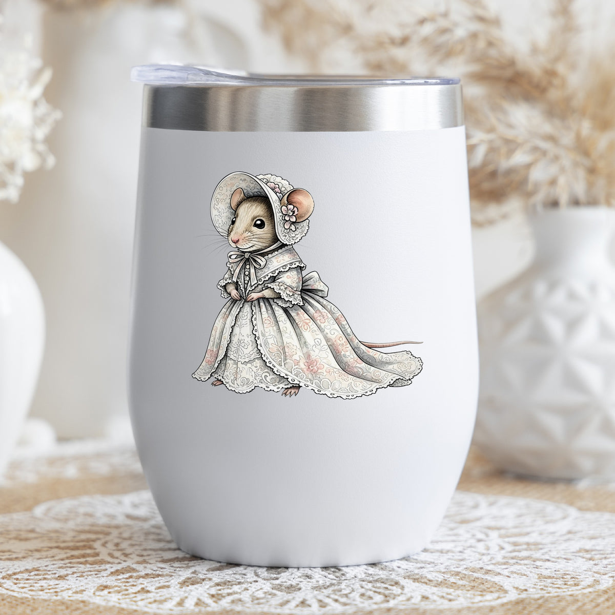 Mouse In Lace Bonnet Dress UV DTF sticker applied to a white stemless tumbler with a lid