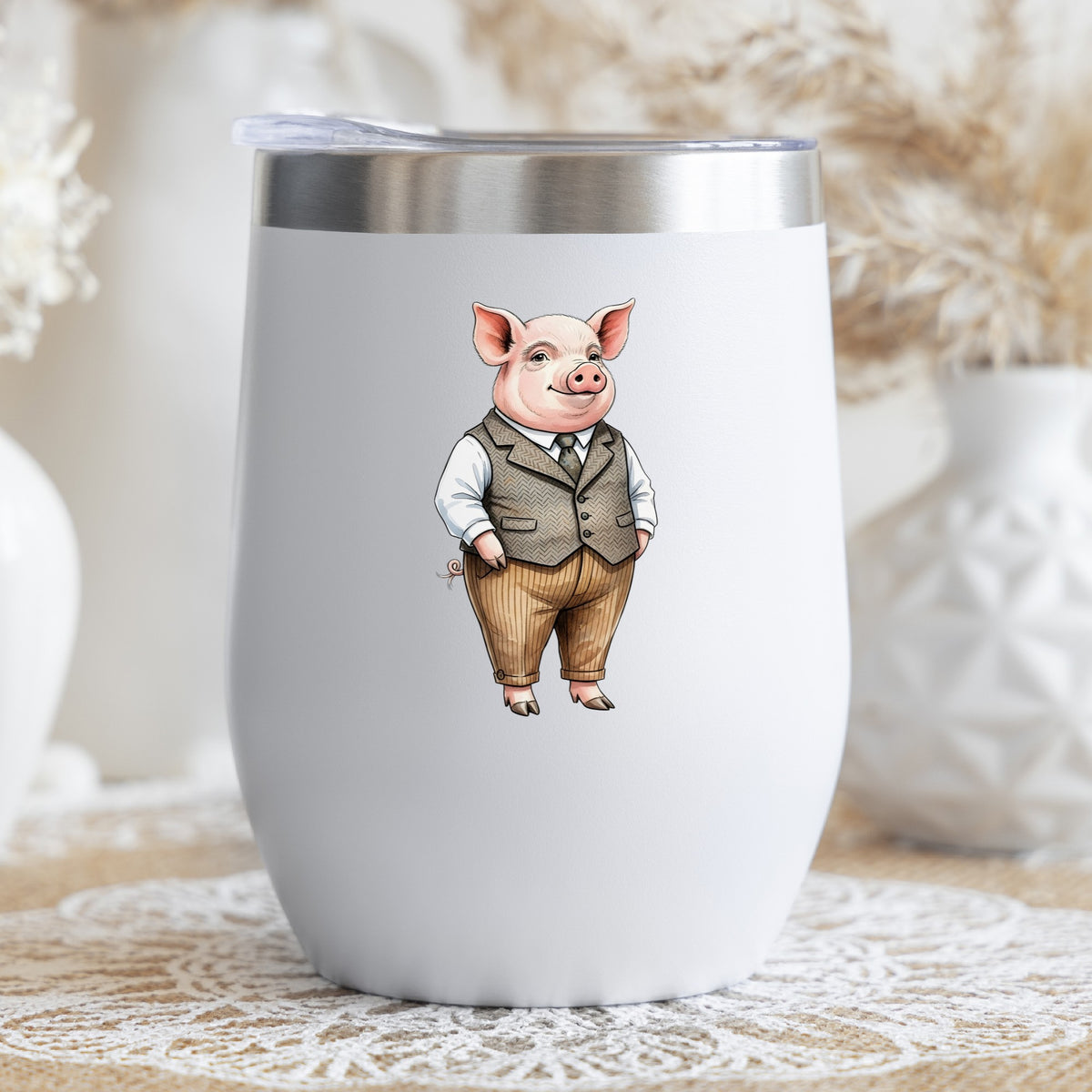 Pig In Tweed Vest UV DTF sticker applied to a white stemless tumbler with a lid