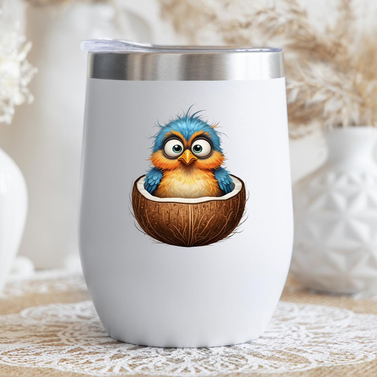 Baby Bird In Coconut Shell UV DTF sticker applied to a white stemless tumbler with a lid