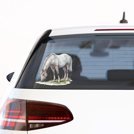 Gray Horse Grazing On Grass UV DTF sticker applied to the rear window of a white car
