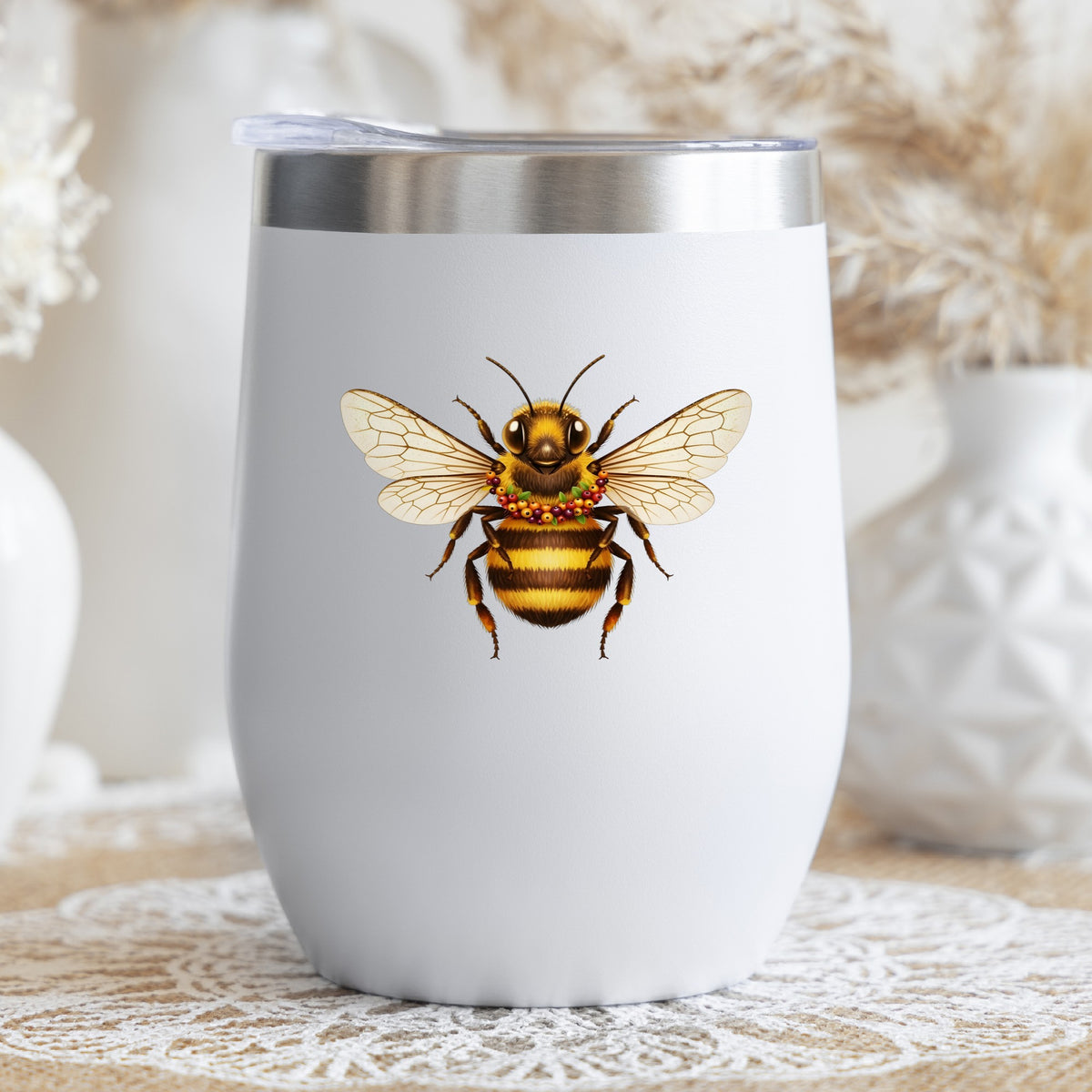 Bee With Berry Garland Necklace UV DTF sticker applied to a white stemless tumbler with a lid