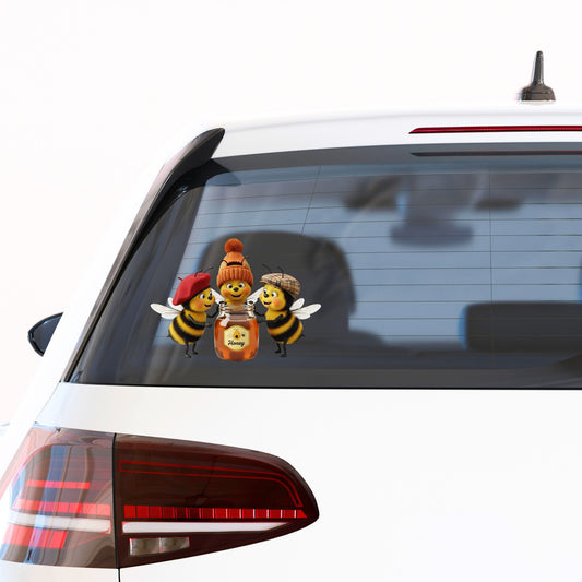 Three Bees With Honey Jar UV DTF sticker applied to the rear window of a white car