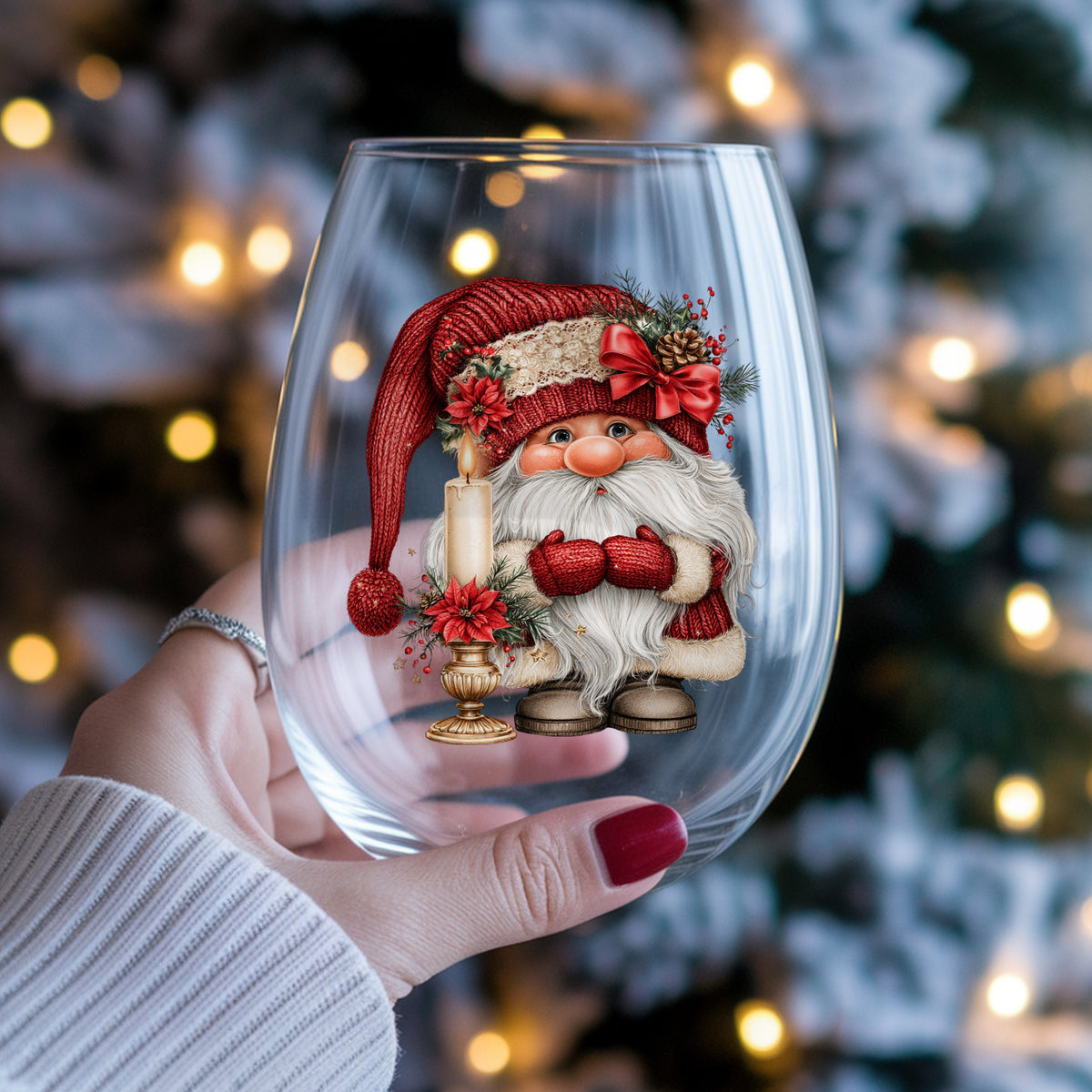 Gnome With Candle UV DTF sticker applied to a stemless wine glass held in hand