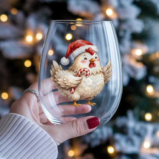 White Hen With Candy Cane UV DTF sticker applied to a stemless wine glass held in hand