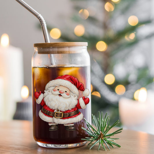 Jolly Santa Claus With Open Arms UV DTF sticker applied to a glass can cup of iced coffee with a straw