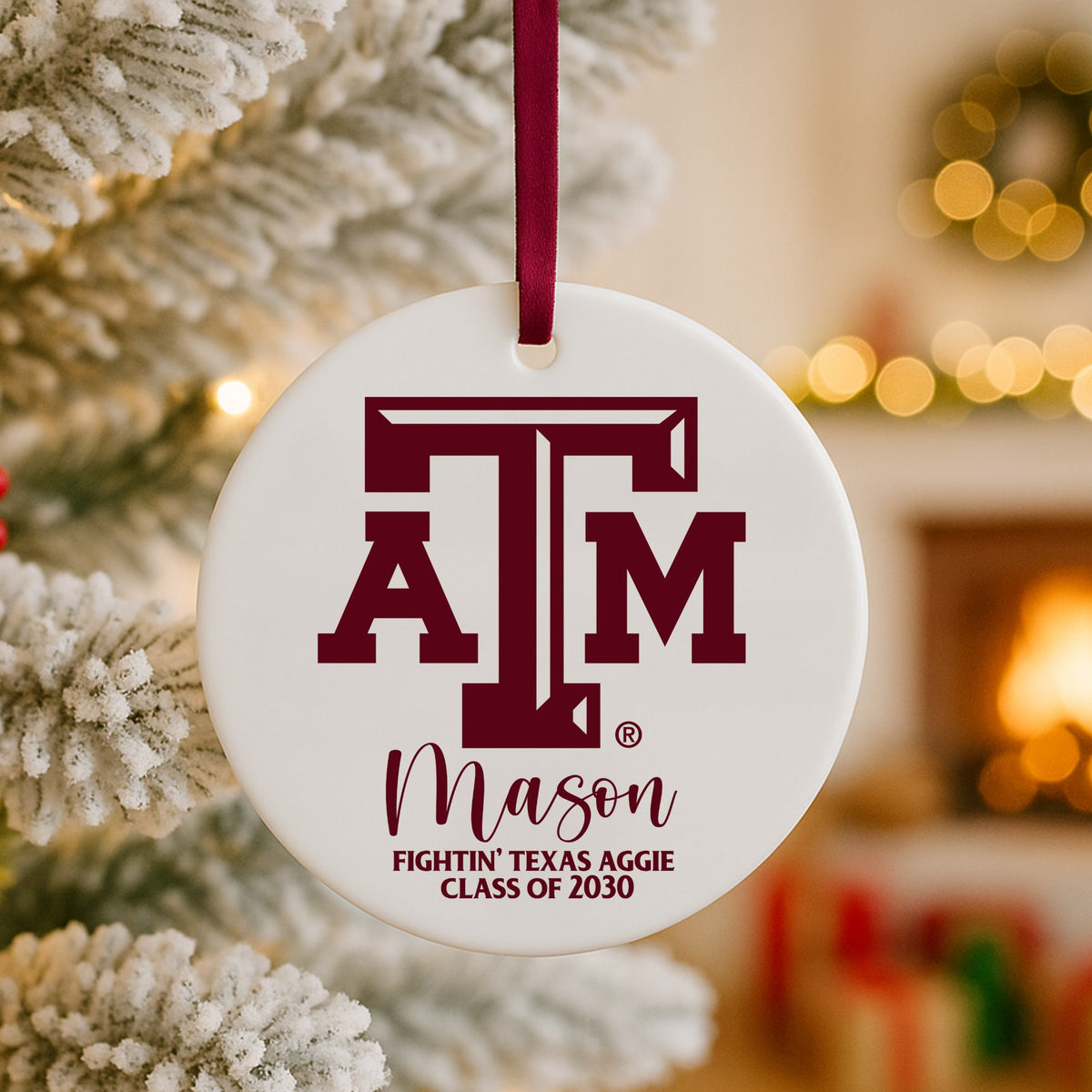 Officially licensed Texas A&M ceramic ornament on a frosted Christmas tree branch