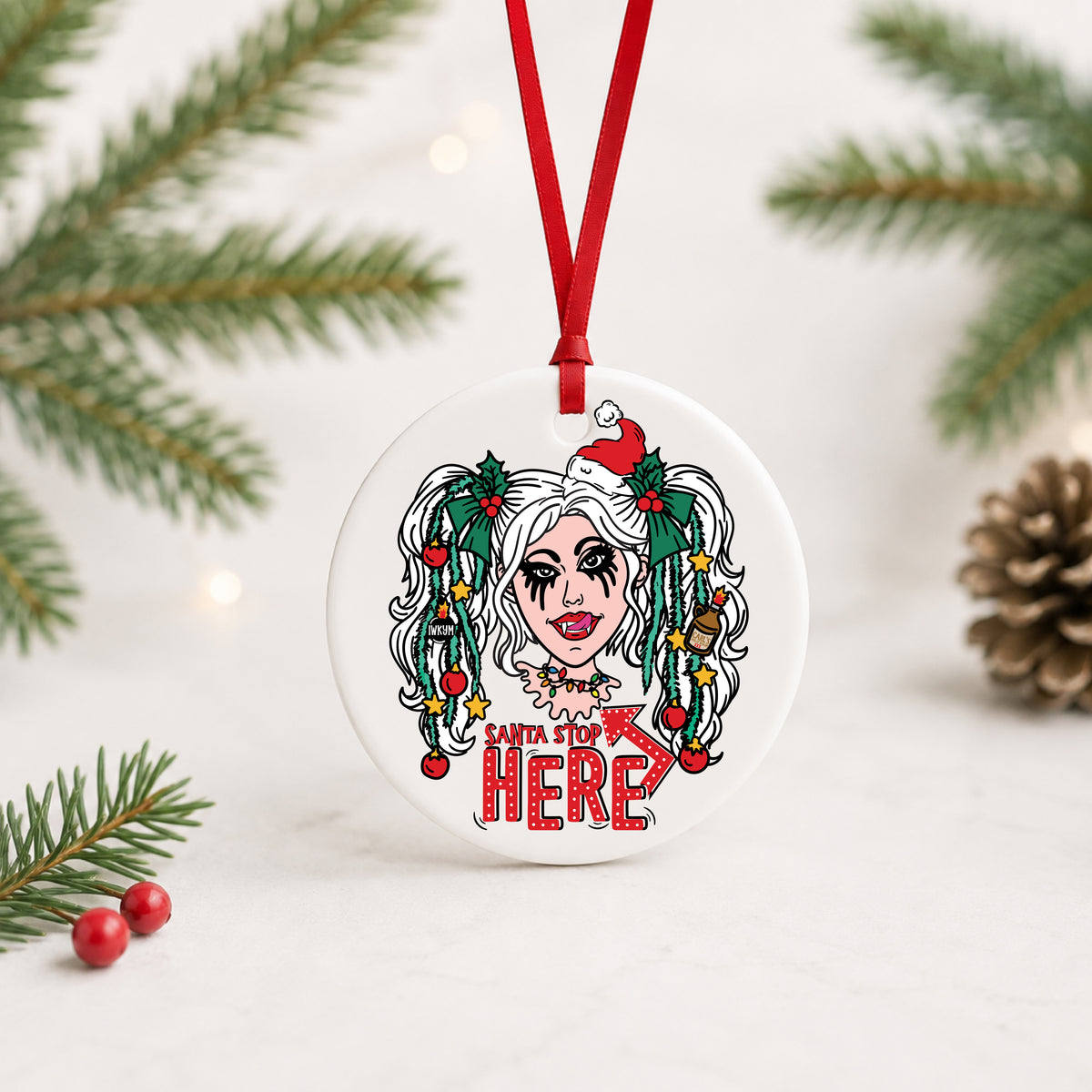 Dungeon Crawler Carl Samantha Santa Stop Here ornament standing on a surface with greenery