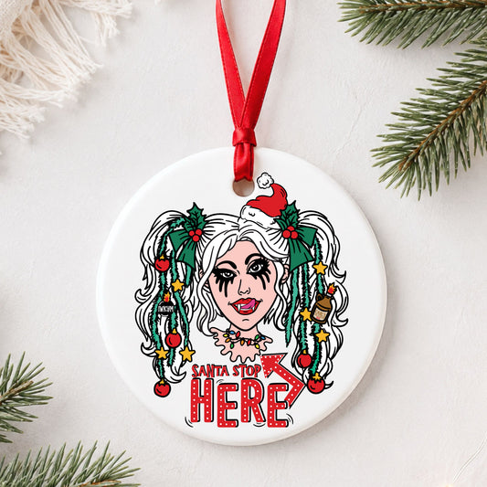 Dungeon Crawler Carl Samantha Santa Stop Here ornament flat lay on white with greenery