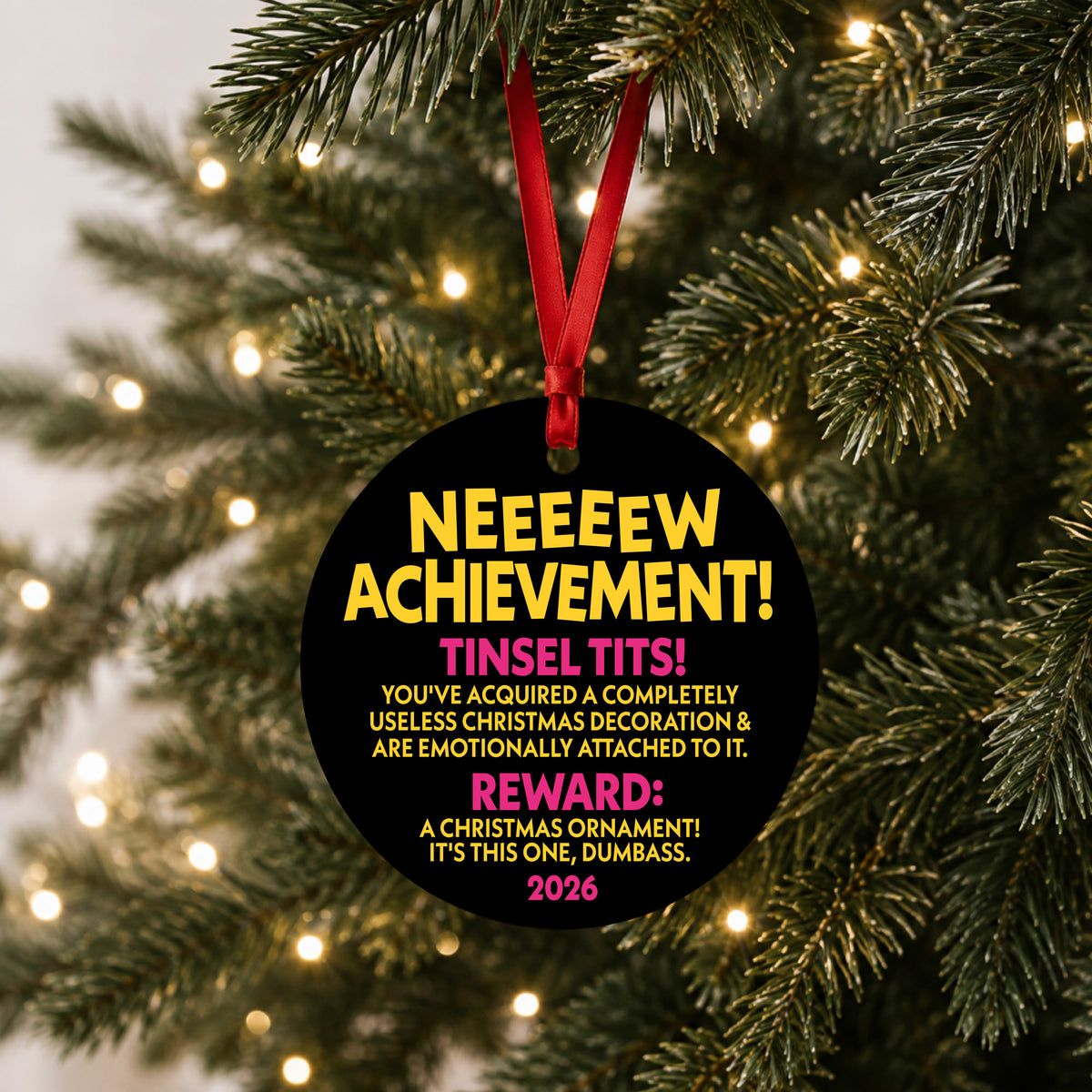 Dungeon Crawler Carl New Achievement ornament hanging on a lit Christmas tree