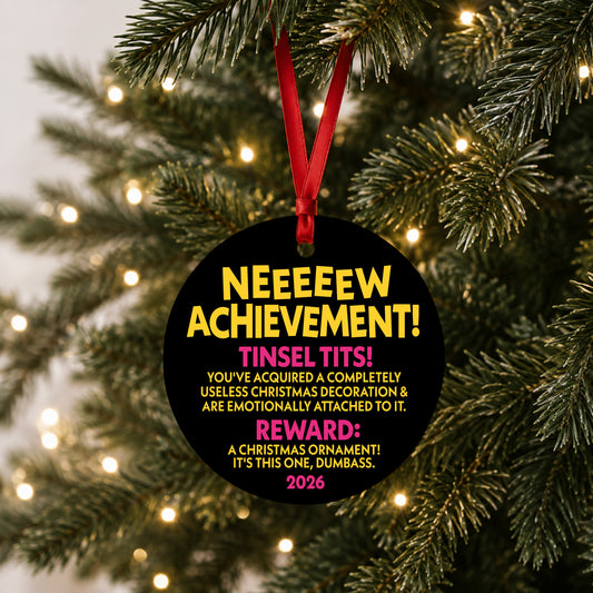 Dungeon Crawler Carl New Achievement ornament hanging on a lit Christmas tree