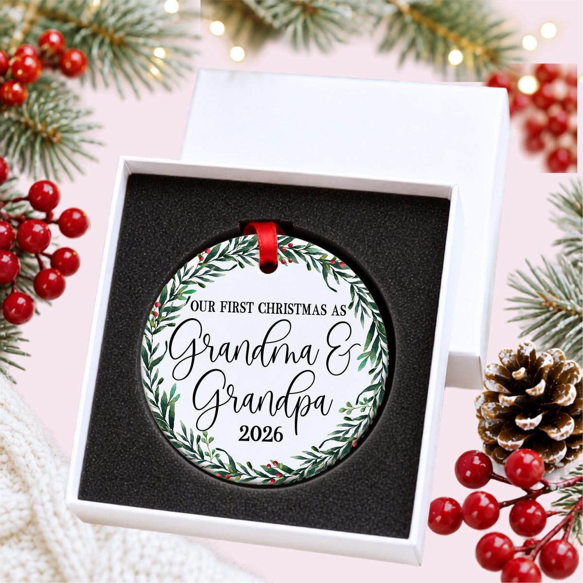 Grandma and Grandpa first Christmas ornament presented in a white gift box with protective black foam