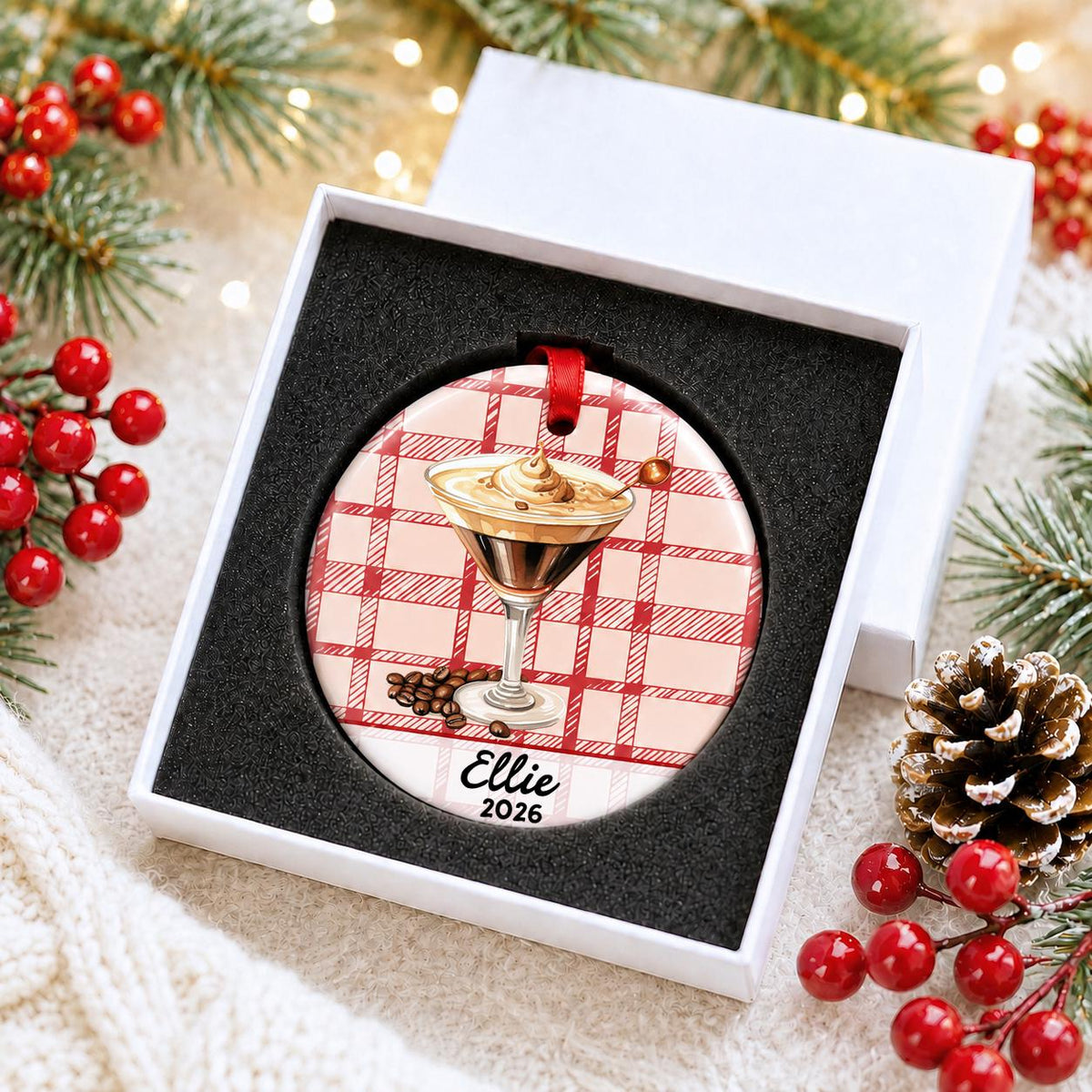 Personalized espresso martini ceramic ornament with name and year on red plaid in a white gift box with protective foam