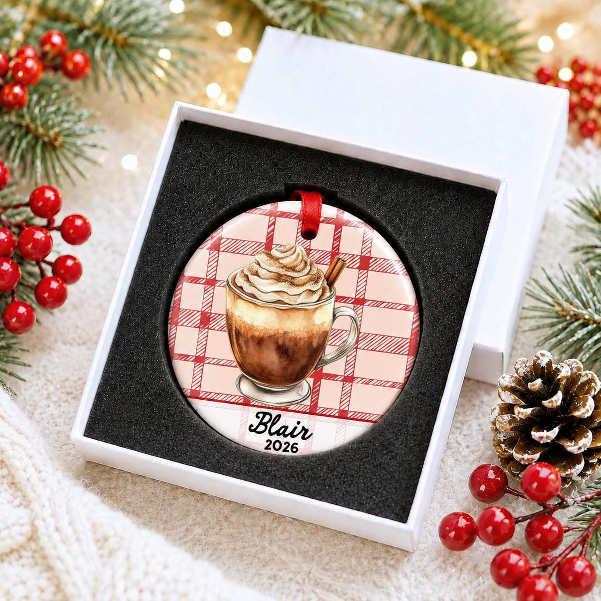 Personalized Mexican hot chocolate ceramic ornament with name and year on red plaid in a white gift box with protective foam