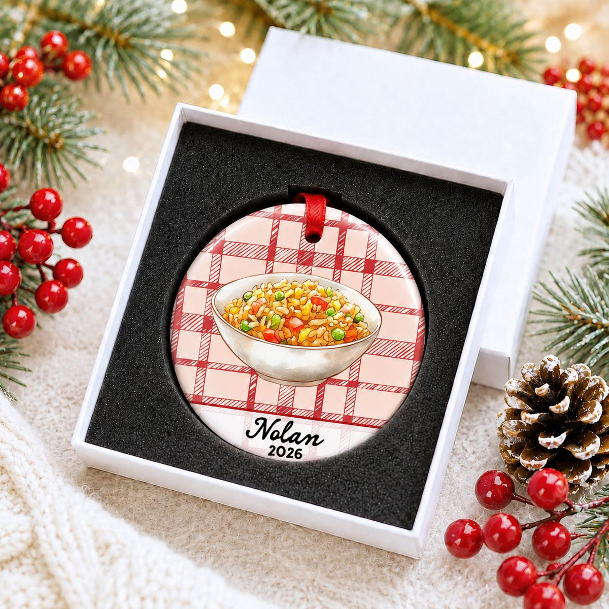 Personalized fried rice ceramic ornament with name and year on red plaid in a white gift box with protective foam