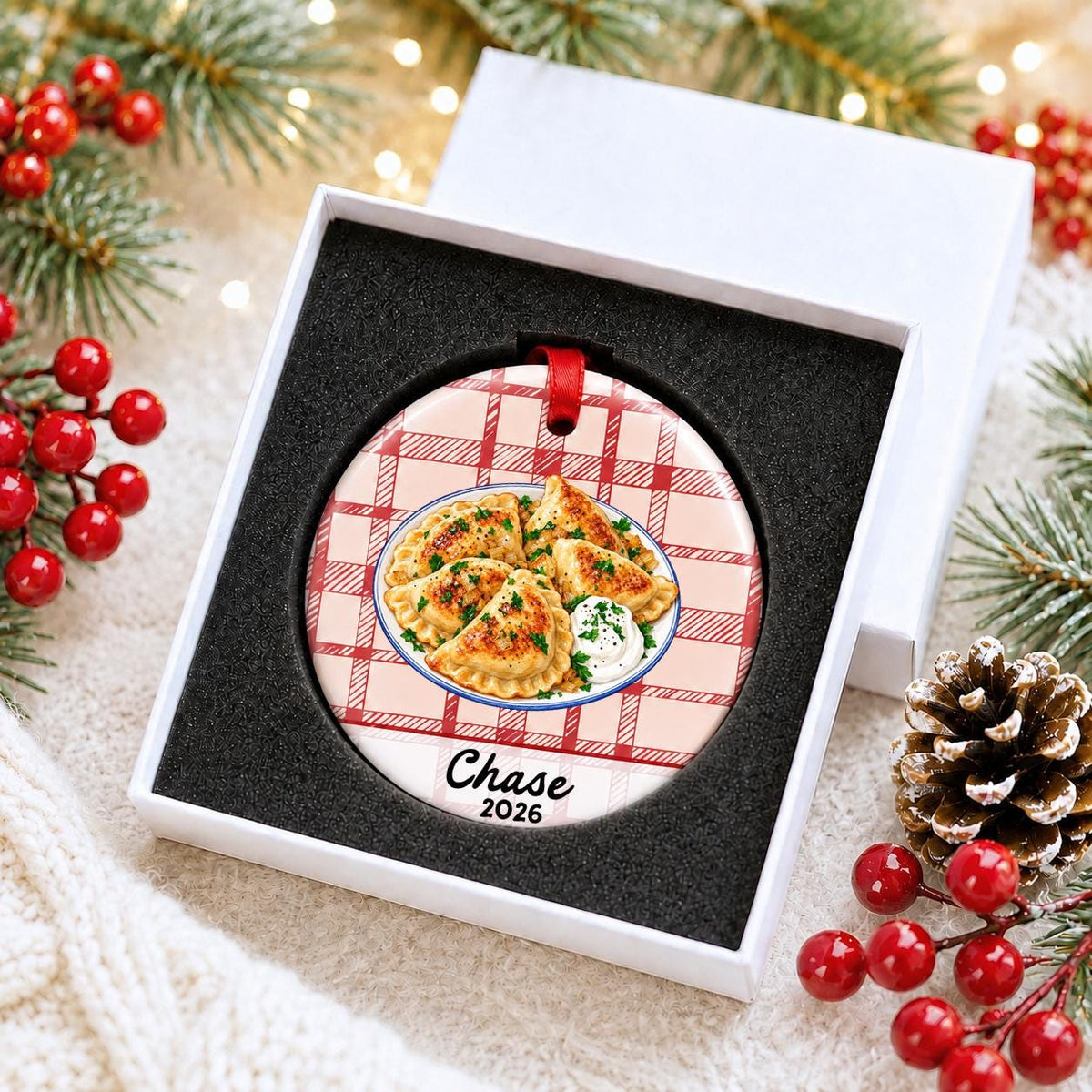 Personalized pierogi ceramic ornament with name and year on red plaid in a white gift box with protective foam