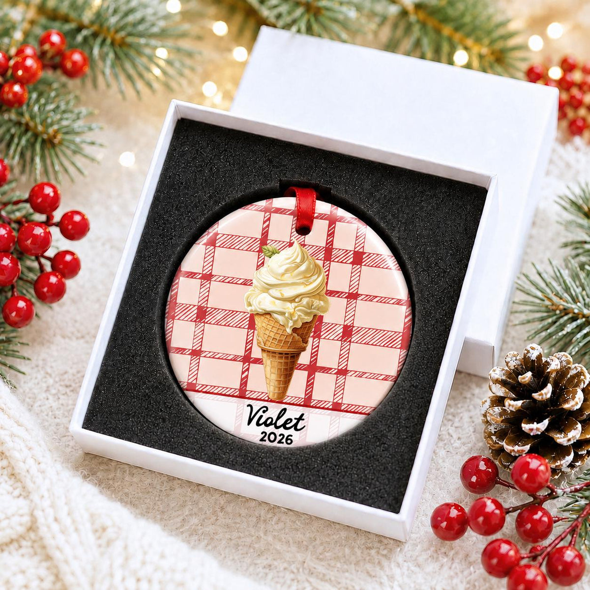Personalized soft serve ice cream ceramic ornament with name and year on red plaid in a white gift box with protective foam