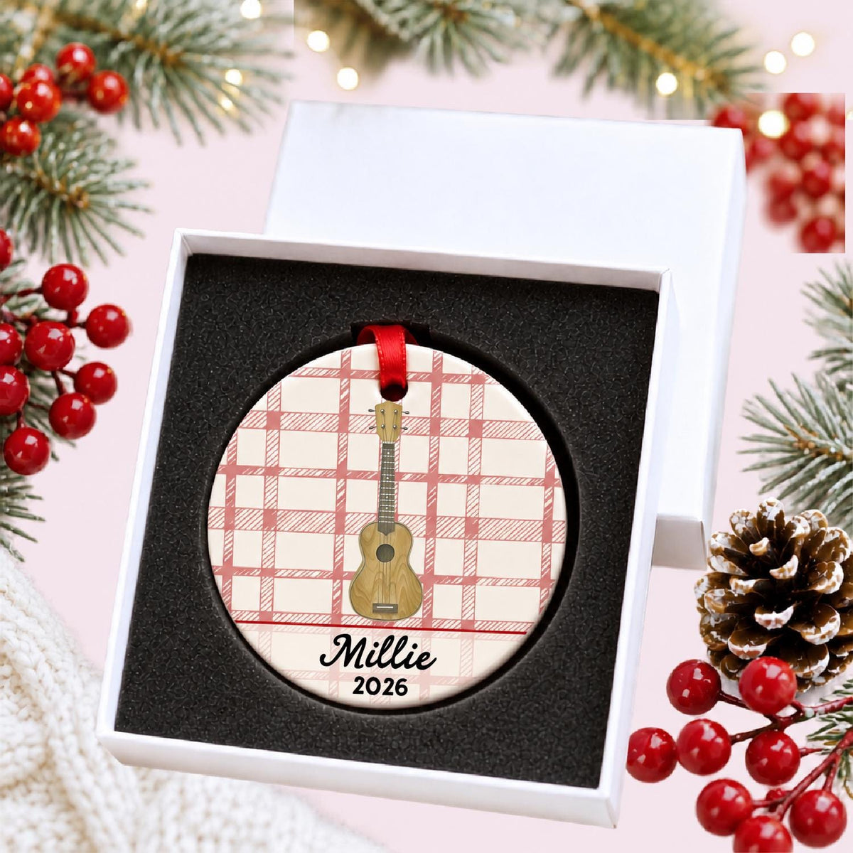 Personalized ukulele ceramic ornament with name and year on red plaid in a white gift box with protective foam