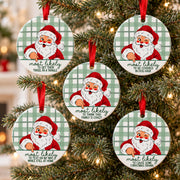 Five Most Likely To Christmas ornaments with vintage Santa and green plaid on a Christmas tree