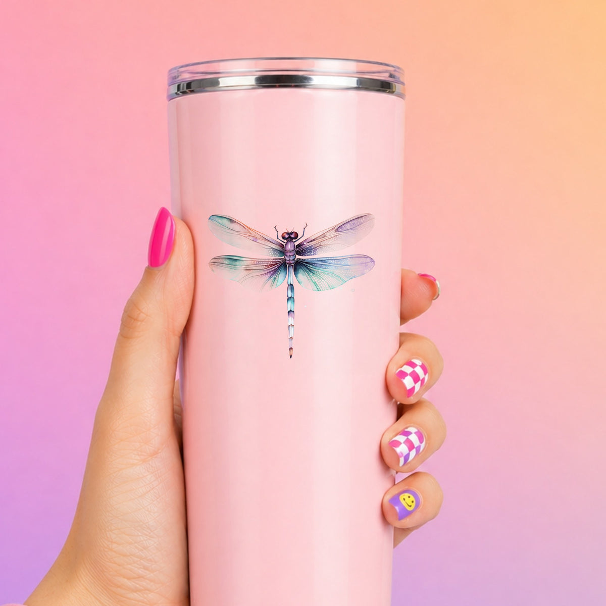 Pastel watercolor dragonfly UV DTF decal on a pink tumbler