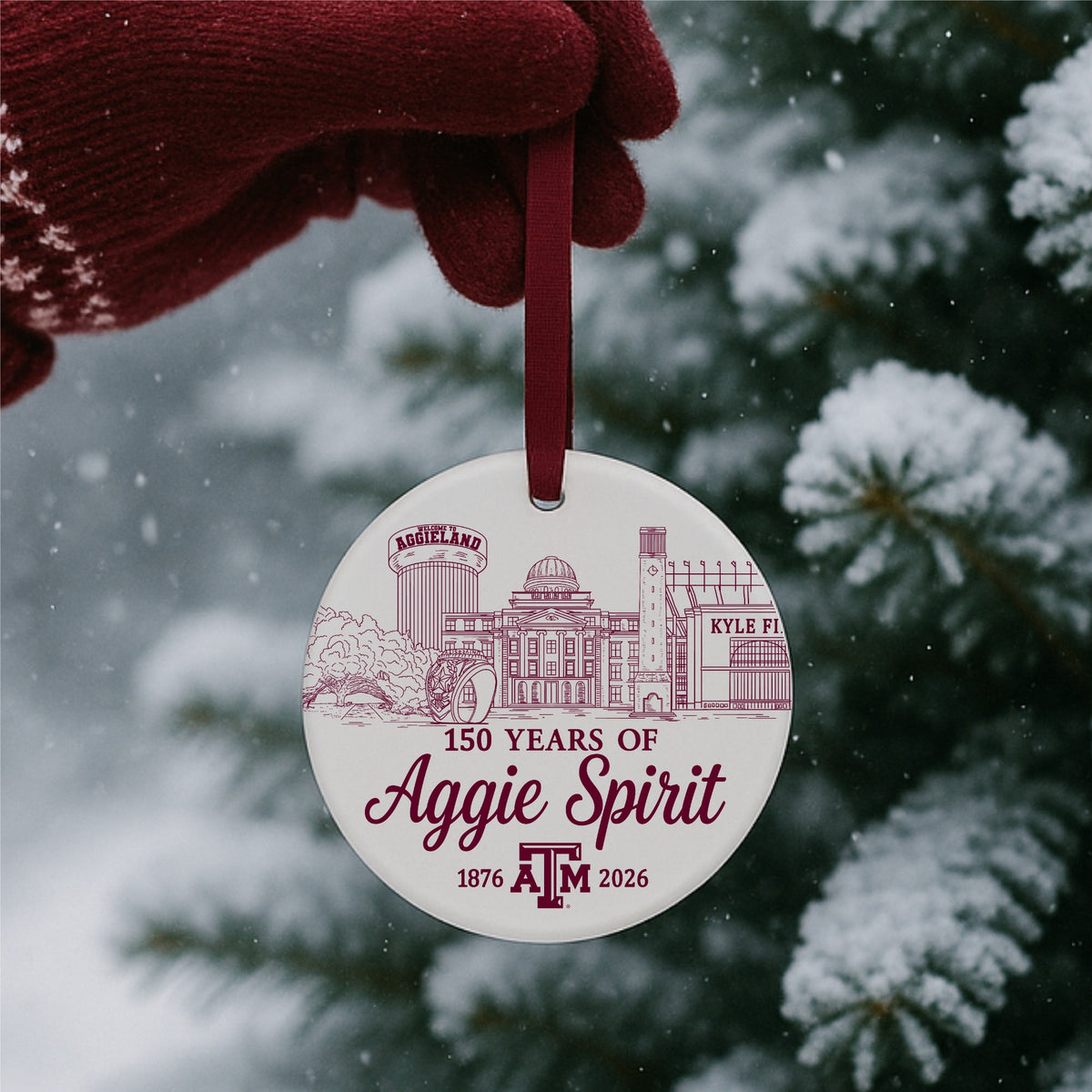 Texas A&M 150 Years of Aggie Spirit ceramic ornament hanging on a Christmas tree