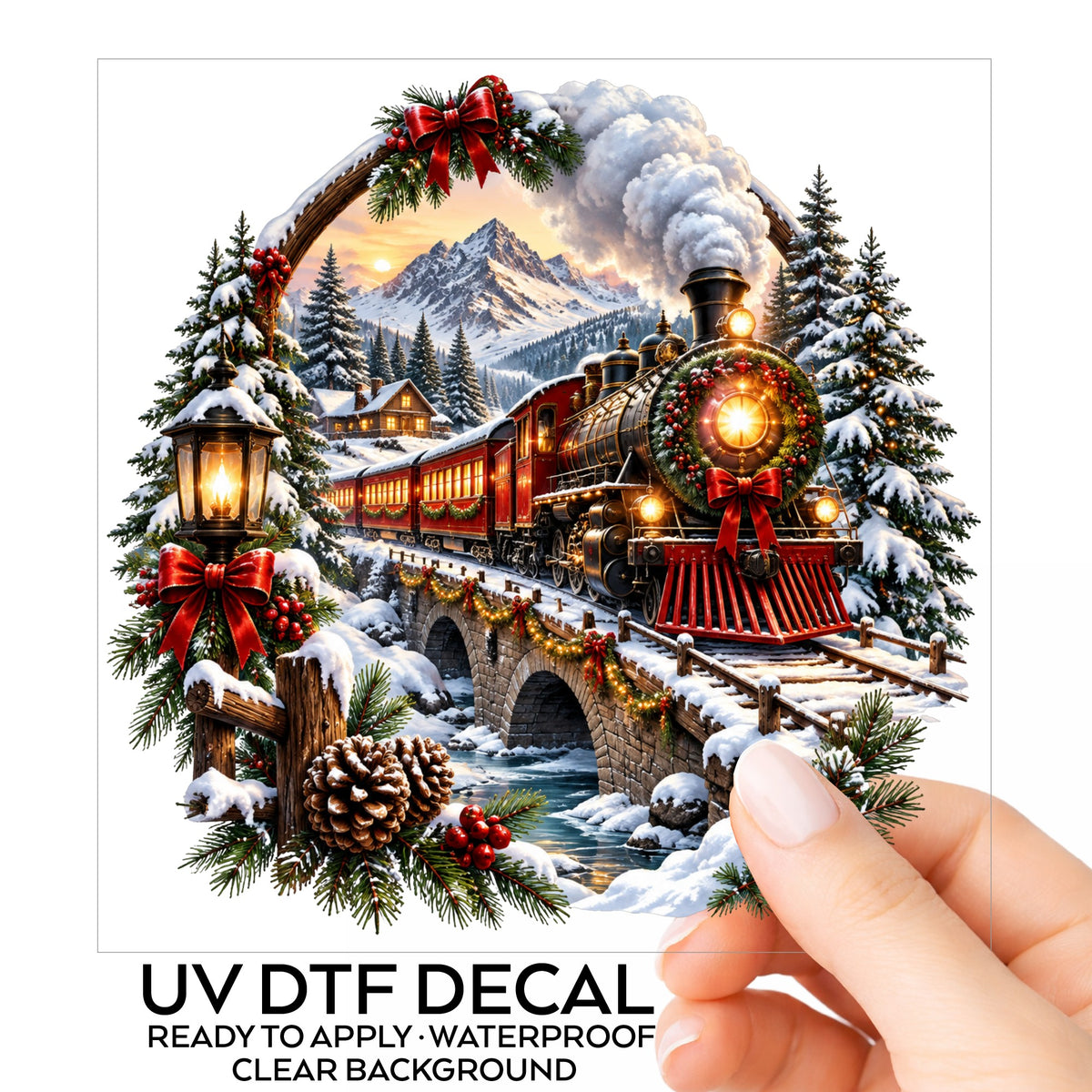 Christmas Train In Snowy Mountains UV DTF sticker on its backing card, held in hand