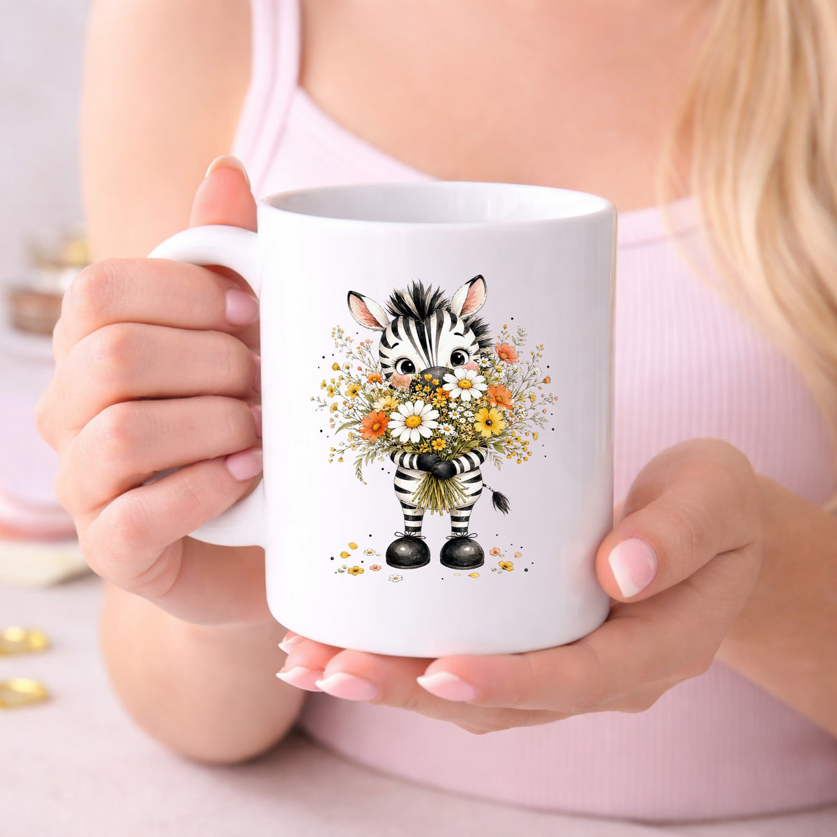 Zebra Holding Wildflower Bouquet UV DTF sticker applied to a white coffee mug held in both hands