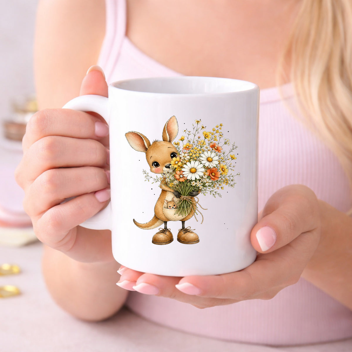 Kangaroo Holding Daisy Bouquet UV DTF sticker applied to a white coffee mug held in both hands