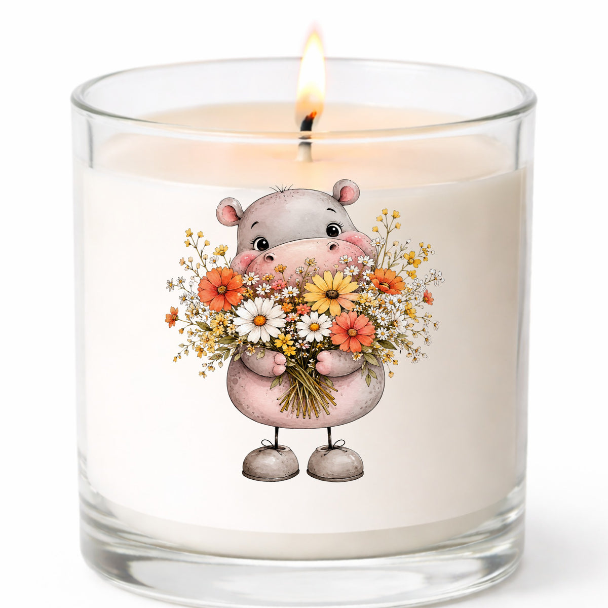 Pink Hippo Holding Wildflower Bouquet UV DTF sticker applied to a white candle in a clear glass jar