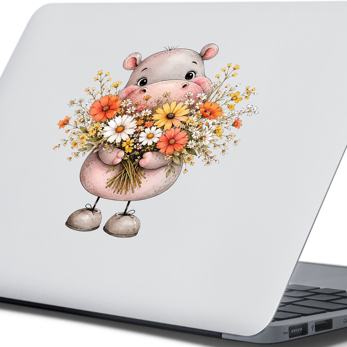 Pink Hippo Holding Wildflower Bouquet UV DTF sticker applied to the lid of a silver laptop