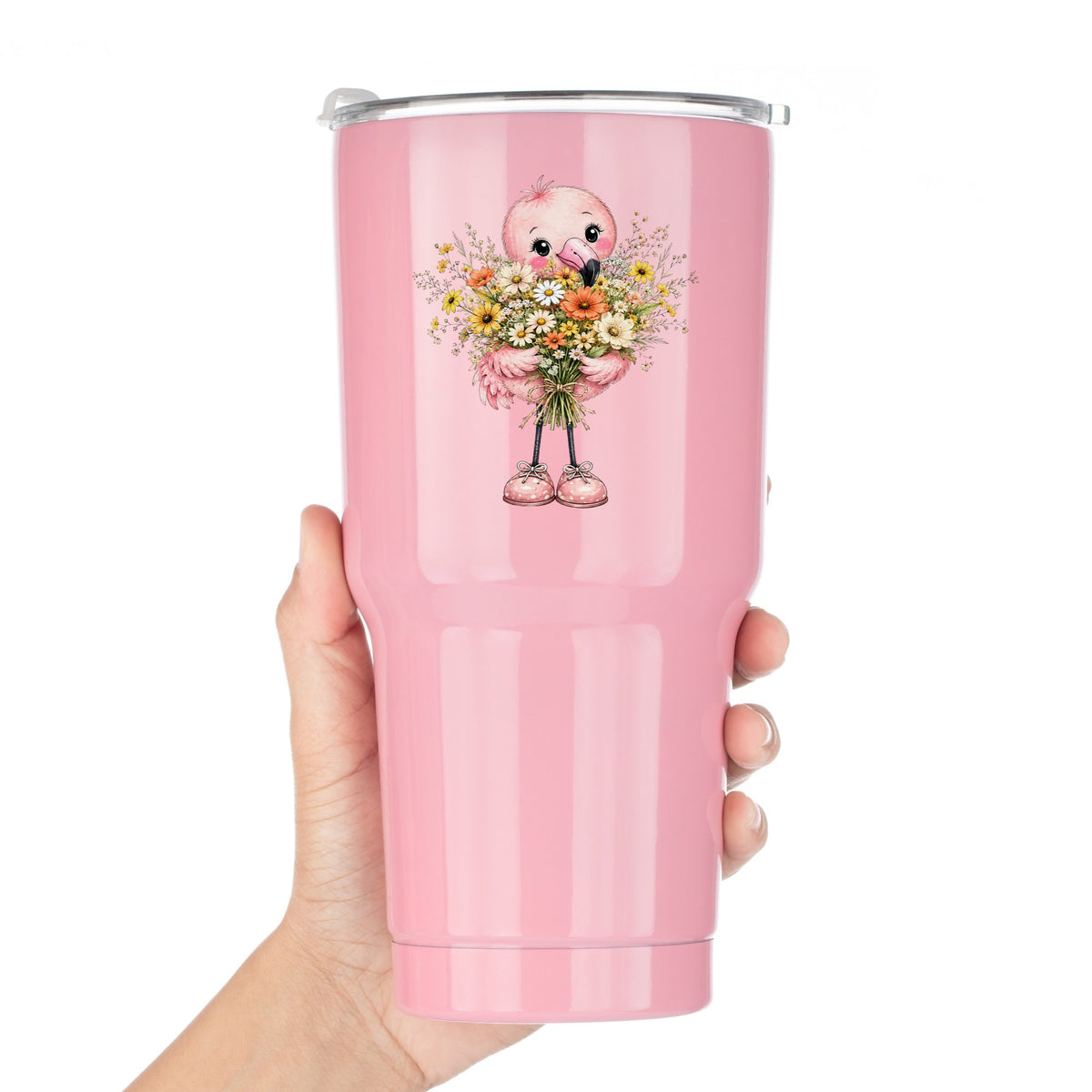 Pink Flamingo Holding Flower Bouquet UV DTF sticker applied to a pink tumbler held against a white background
