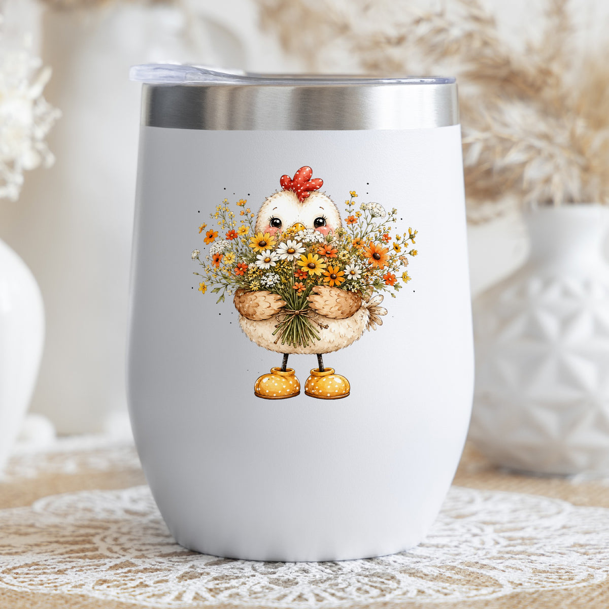 Chicken Holding Wildflower Bouquet UV DTF sticker applied to a white stemless tumbler with a lid