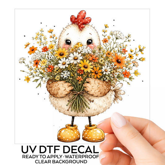 Chicken Holding Wildflower Bouquet UV DTF sticker on its backing card, held in hand