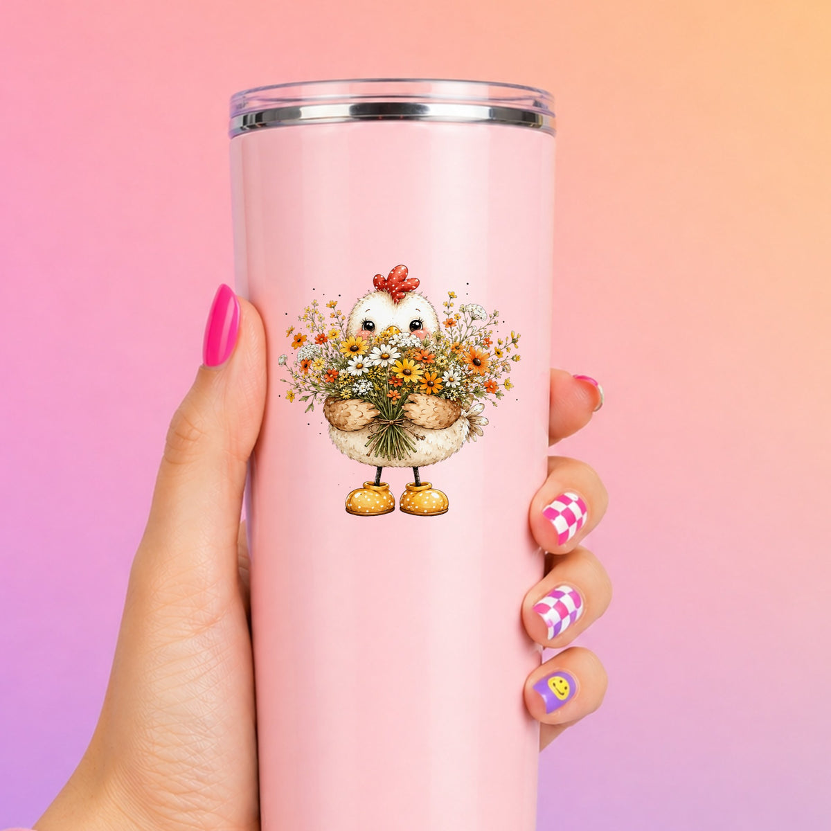 Chicken Holding Wildflower Bouquet UV DTF sticker applied to a tall pink tumbler on a pink and orange background