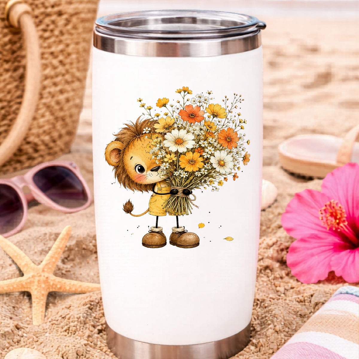 Baby Lion Holding Wildflower Bouquet UV DTF sticker applied to a white travel tumbler on beach sand