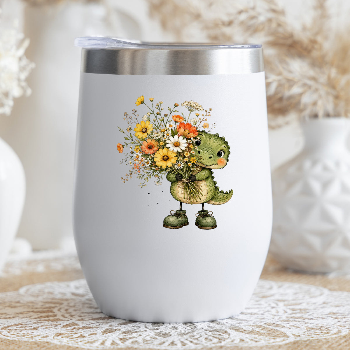 Baby Crocodile Holding Flower Bouquet UV DTF sticker applied to a white stemless tumbler with a lid