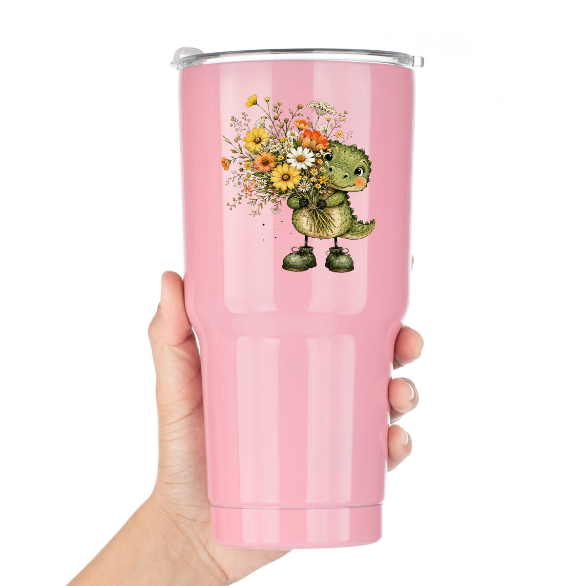 Baby Crocodile Holding Flower Bouquet UV DTF sticker applied to a pink tumbler held against a white background